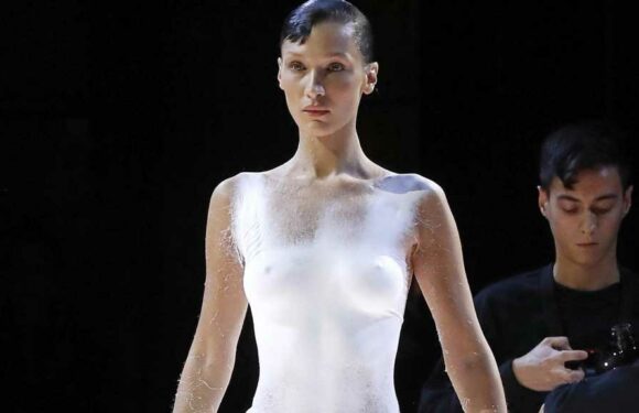 'Nude' Bella Hadid Has Dress Sprayed Onto Her on PFW Runway