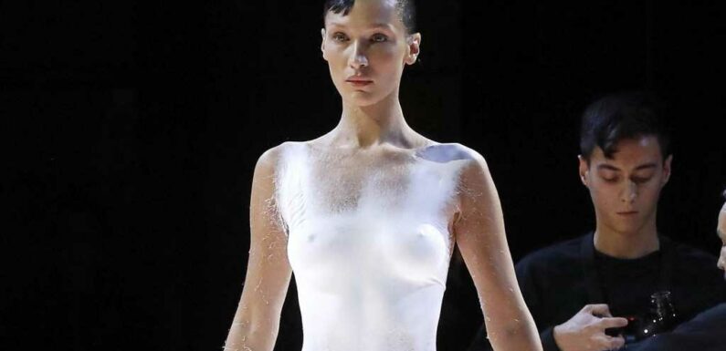 'Nude' Bella Hadid Has Dress Sprayed Onto Her on PFW Runway