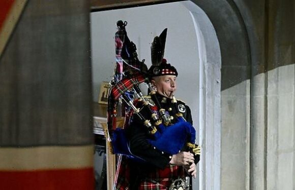 A last lament for The Queen: Monarch's bagpiper plays moving rendition