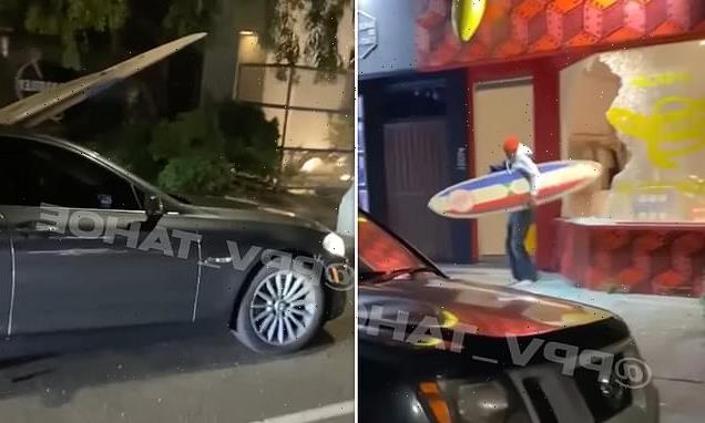 Bizarre video shows thief steal several surfboards from LA shop