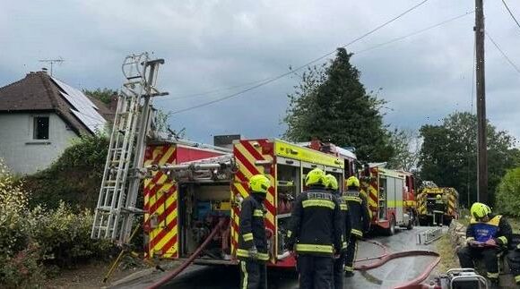 Families evacuated as huge fire breaks out at popular holiday park with fire fighters rushing to leisure centre | The Sun