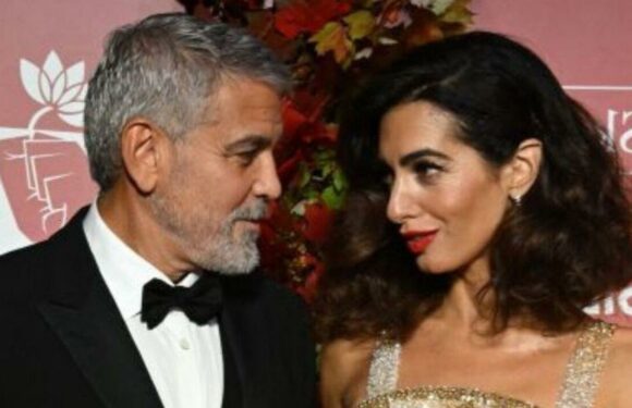 George Clooney gazes adoringly at wife Amal who he’s never argued with