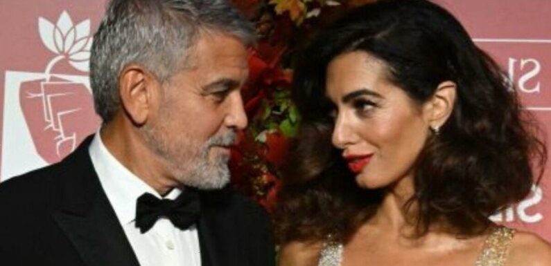 George Clooney gazes adoringly at wife Amal who he’s never argued with
