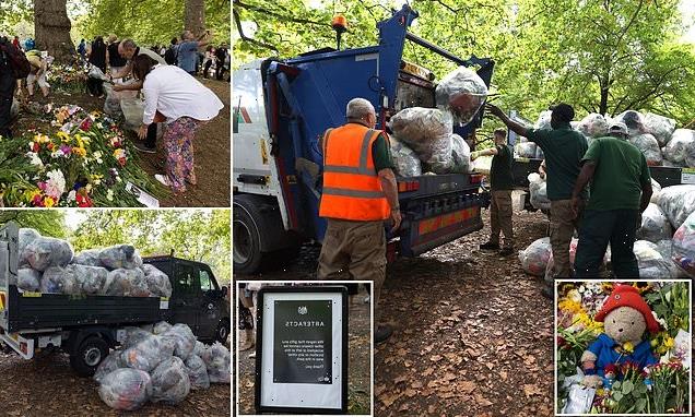 Green Park workers pile up dozens of bags of plastic flower wrappings