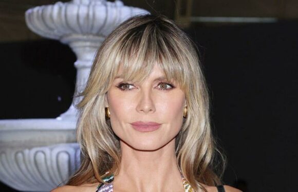 Heidi Klum, 49, shows off her ageless figure in eye-popping jumpsuit