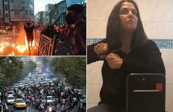 Iranian women hack off hair and burn hijabs as ten protesters die