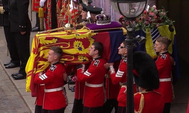 King Charles in procession as Queen is marched from Westminster Abbey