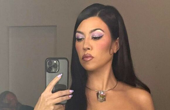Kourtney Kardashian reveals if she's pregnant with Travis Barker's baby after cradling her stomach in shocking photo | The Sun