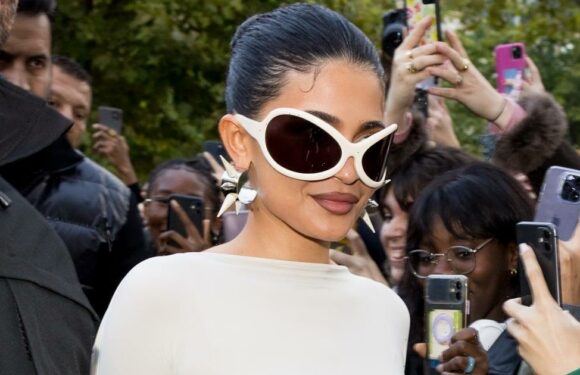 Kylie Jenner Wears Her Underwear Over Sheer Tights at Paris Fashion Week