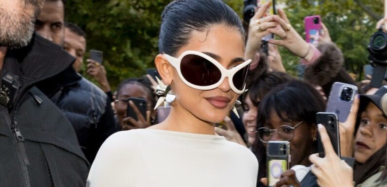 Kylie Jenner Wears Her Underwear Over Sheer Tights at Paris Fashion Week