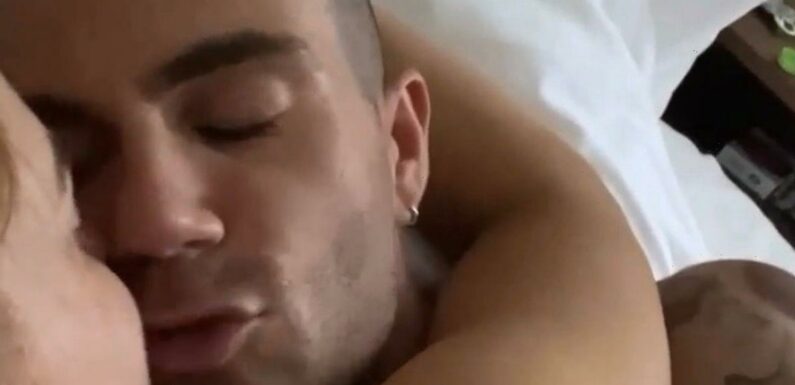 Max George and Maisie Smith cuddle in naked bed video after his ex issues warning