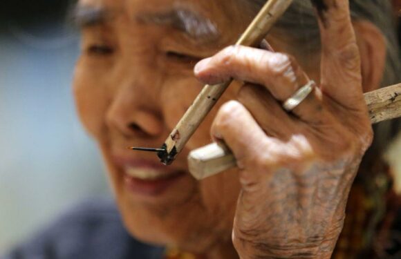 Meet the world’s oldest tattoo artist at 105 – and she’s covered in ink herself