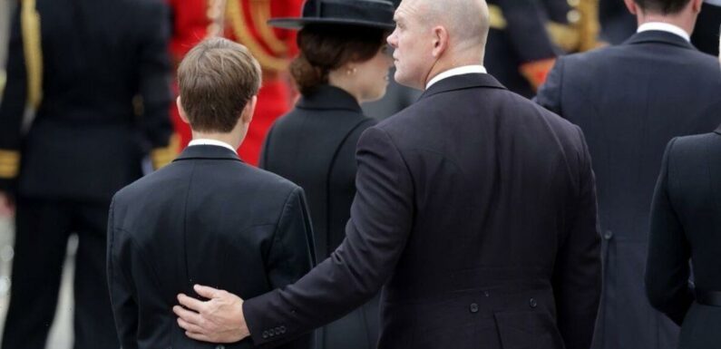 Mike Tindall shows protective body language at Queens funeral