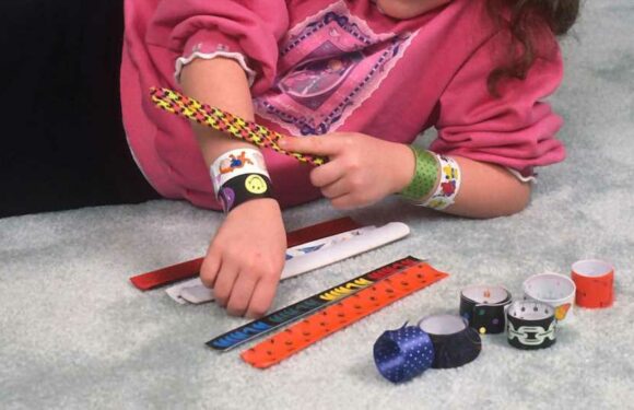 People are only just realizing what’s inside their old slap bracelets & it’s actually really useful | The Sun