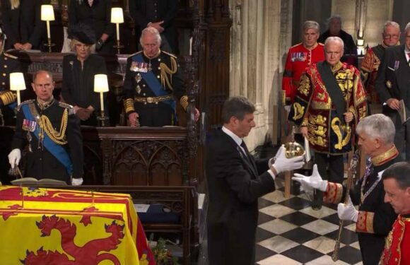 Poignant moment King Charles takes Queen's place inside St George's Chapel as her coffin is lowered into vault | The Sun