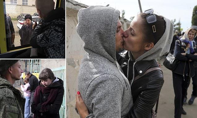 Russian couples hug in tearful goodbyes before men sent into Ukraine