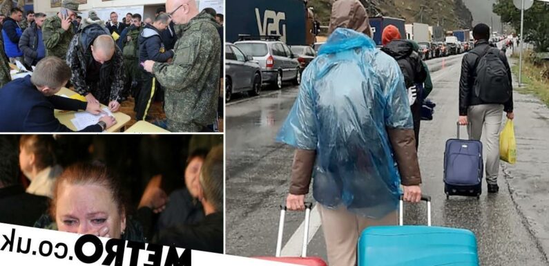 Russians drag suitcases across border to escape Putin's mobilisation order