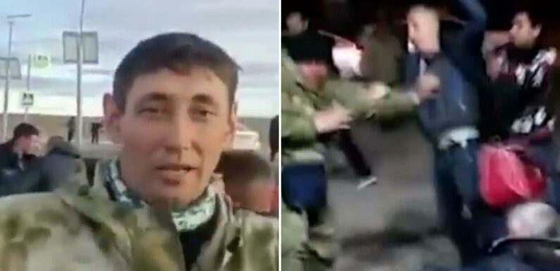 Watch Putin’s drunk conscripts fight EACH OTHER as they are loaded onto school buses to become ‘cannon fodder’ | The Sun