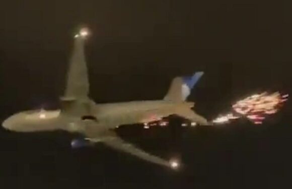Watch as flaming debris from passenger plane rains down near cars at airport | The Sun