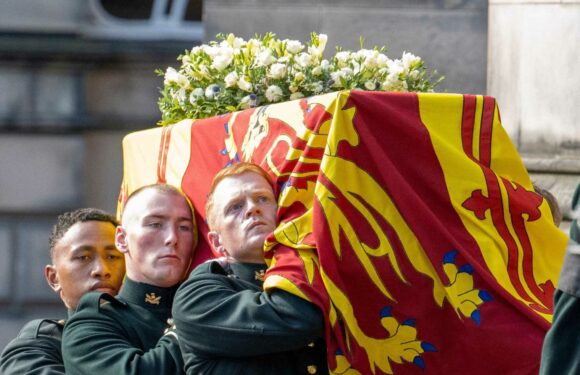 What is the Royal Standard flag and why is it draped over the Queen's coffin? | The Sun