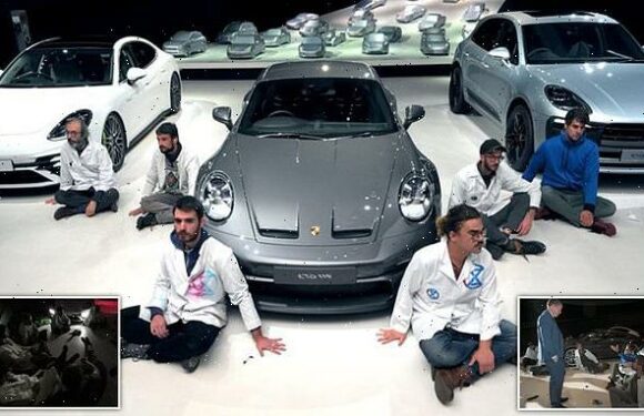 Activists left in the dark after gluing themselves to Volkswagen floor