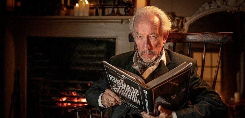 Actor Simon Callow sits down for spooky story time – to warn Brits about fraud