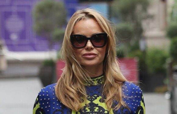 Amanda Holden braves braless display in skintight mini dress