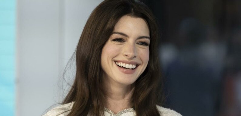 Anne Hathaway’s Hot-Pink Miniskirt Nods to "Clueless" and Barbiecore