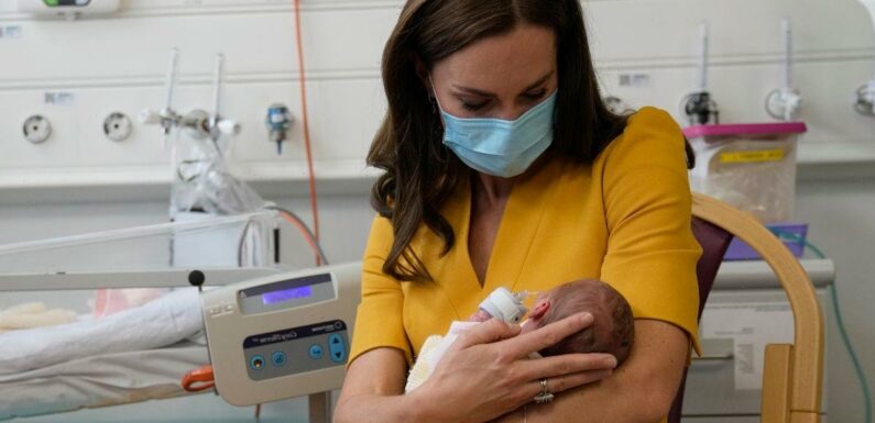‘Broody’ Kate Middleton lovingly cradles tiny baby after William hints at baby number four