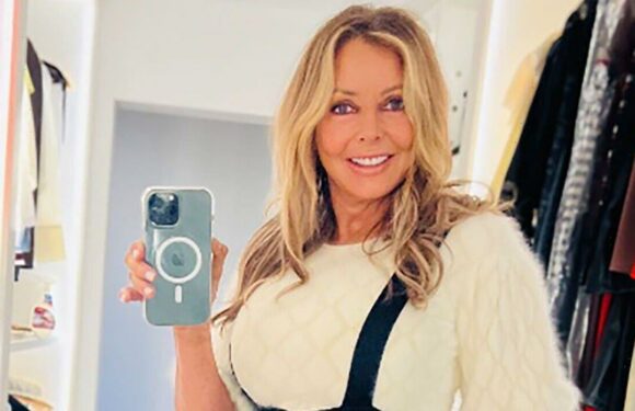 Carol Vorderman sparks frenzy in tight frock and knee-high boots