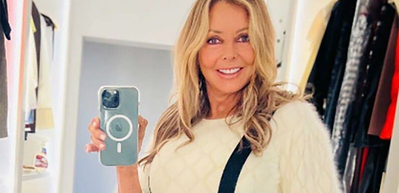 Carol Vorderman sparks frenzy in tight frock and knee-high boots
