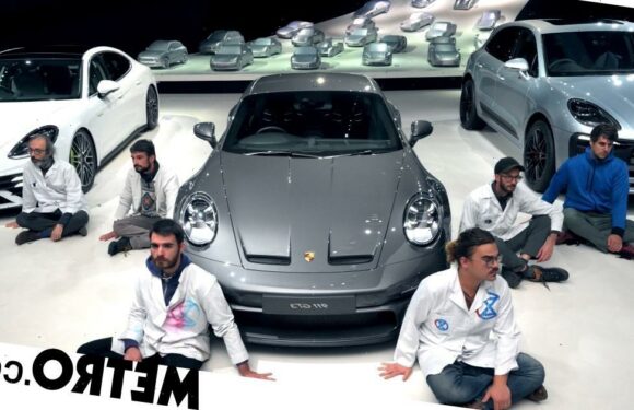 Climate protestors who glued themselves to Volkswagen's floor left in the dark