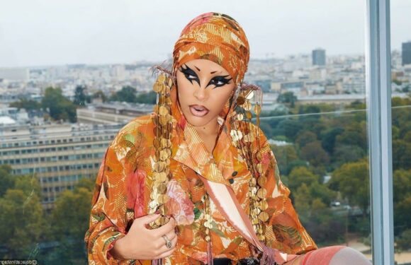 Doja Cat Defends Her Bizarre Makeup at Paris Fashion Week After Called ‘Ugly’