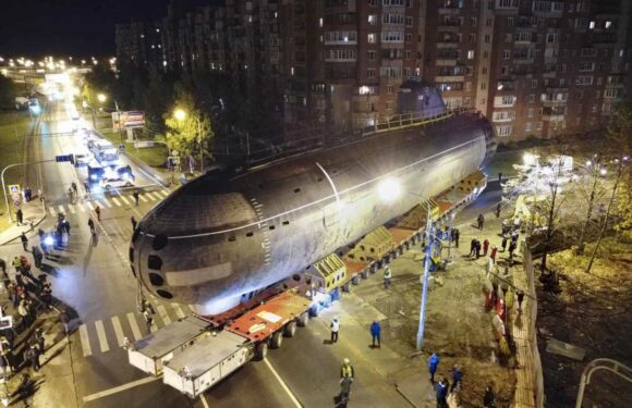 Extraordinary moment 3,000-ton nuclear submarine dubbed the 'Whale' is paraded through streets of Russia | The Sun