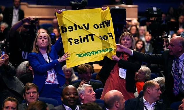 Greenpeace protesters storm Liz Truss's first Tory conference speech