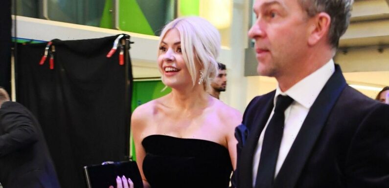 Holly Willoughby supported by husband at NTAs as Philip Schofield makes low-key arrival