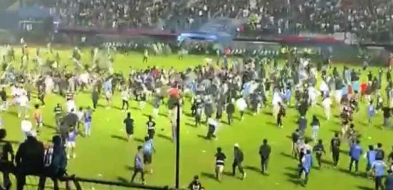 Horror football riots leave at least 127 people dead including children and police officers after fans storm pitch | The Sun