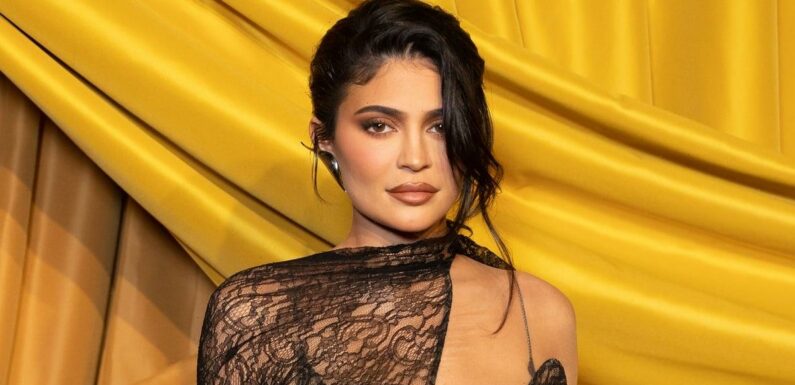 Kylie Jenner Channels Batman in a Plunging Jumpsuit and a Corset With Fake Abs