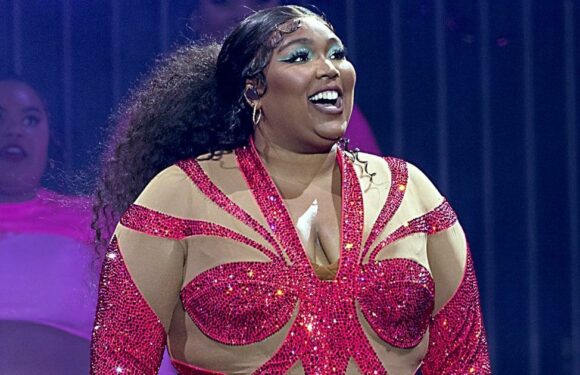 Lizzo Dances in Butt-Cutout Leggings and a Matching Pink Bra