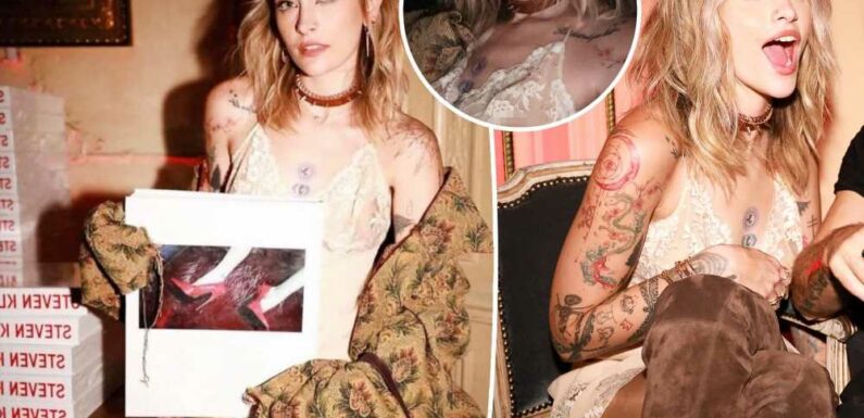 Paris Jackson flashes nipple piercing in lace dress at Paris Fashion Week
