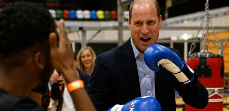 Prince William shows off his right royal hook in charity boxing session while wearing suit | The Sun