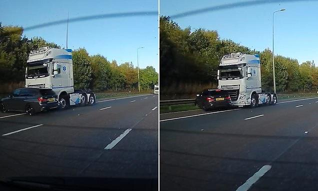 Rear-view camera captures moment lorry and BMW collide on the M62