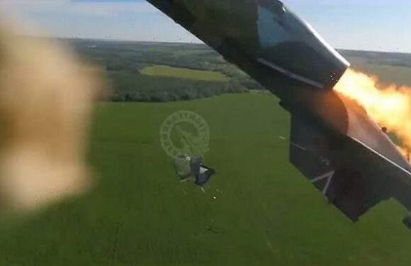 Russian pilot ejects from burning fighter jet as it crashes