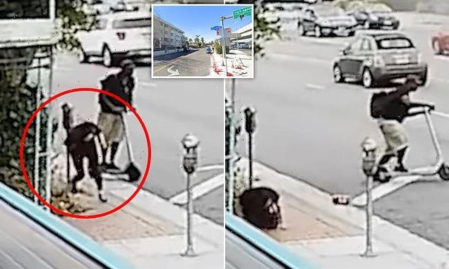 Shocking moment scooter-riding brute beats woman on street corner