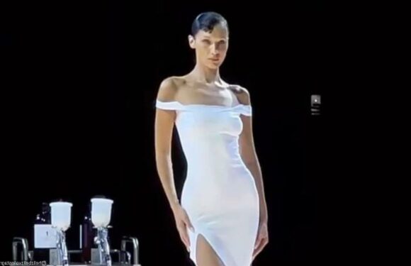 Topless Bella Hadid Gets Spray-On Dress on Runway at Paris Fashion Week