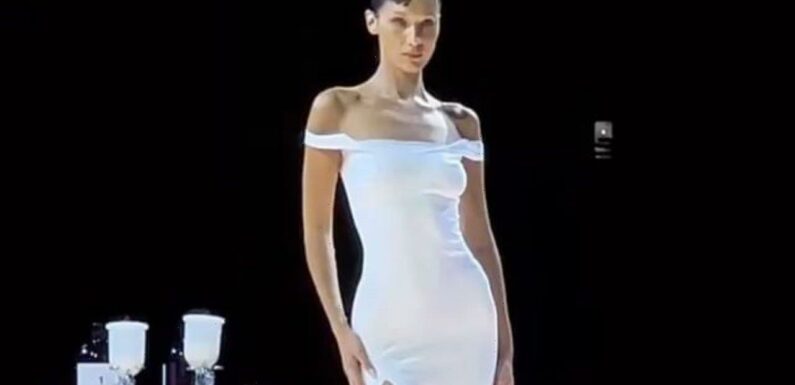 Topless Bella Hadid Gets Spray-On Dress on Runway at Paris Fashion Week