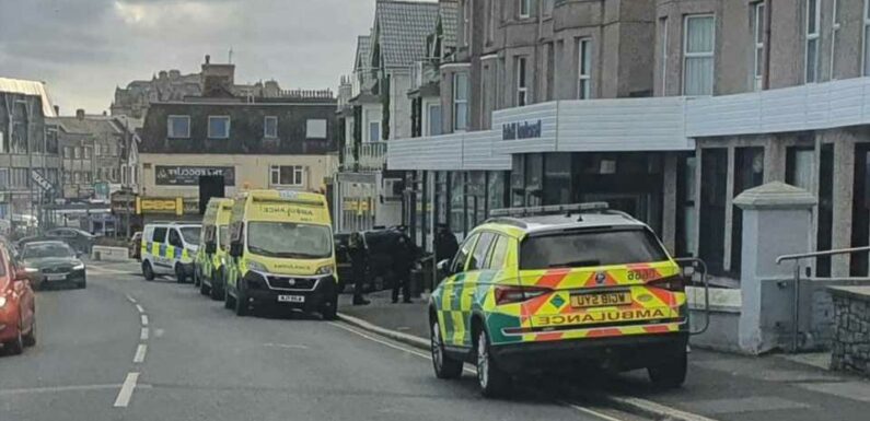 Beresford Hotel in Newquay surrounded by cops & ambulance staff after ‘incident’ at lodge that's housing asylum seekers | The Sun
