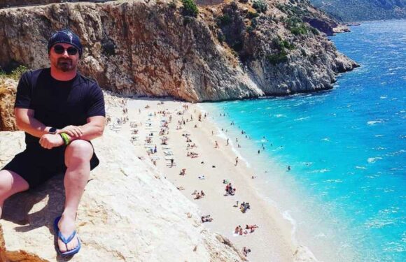 Chilling moment brazen husband who pushed pregnant wife off cliff poses for tribute snap at death scene months later | The Sun