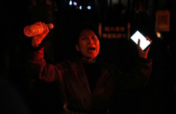 China lockdown protests pause as police flood city streets – The Denver Post