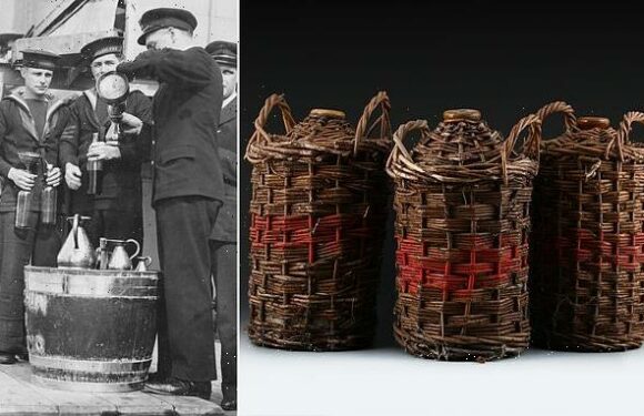 Flagons of dark rum issued by the MoD to Royal Navy sailors for sale